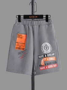 SHEIN Tween Boy Casual Printed Pattern Round Neck Short Sleeve T-Shirt And Printed Shorts 2 Piece Set