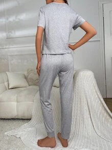 愛心和標語圖案前繫帶休閒服套裝