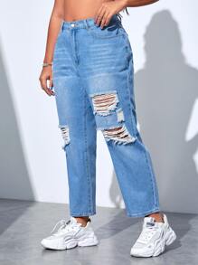 Jeans ajustados mom desgarro de talle alto