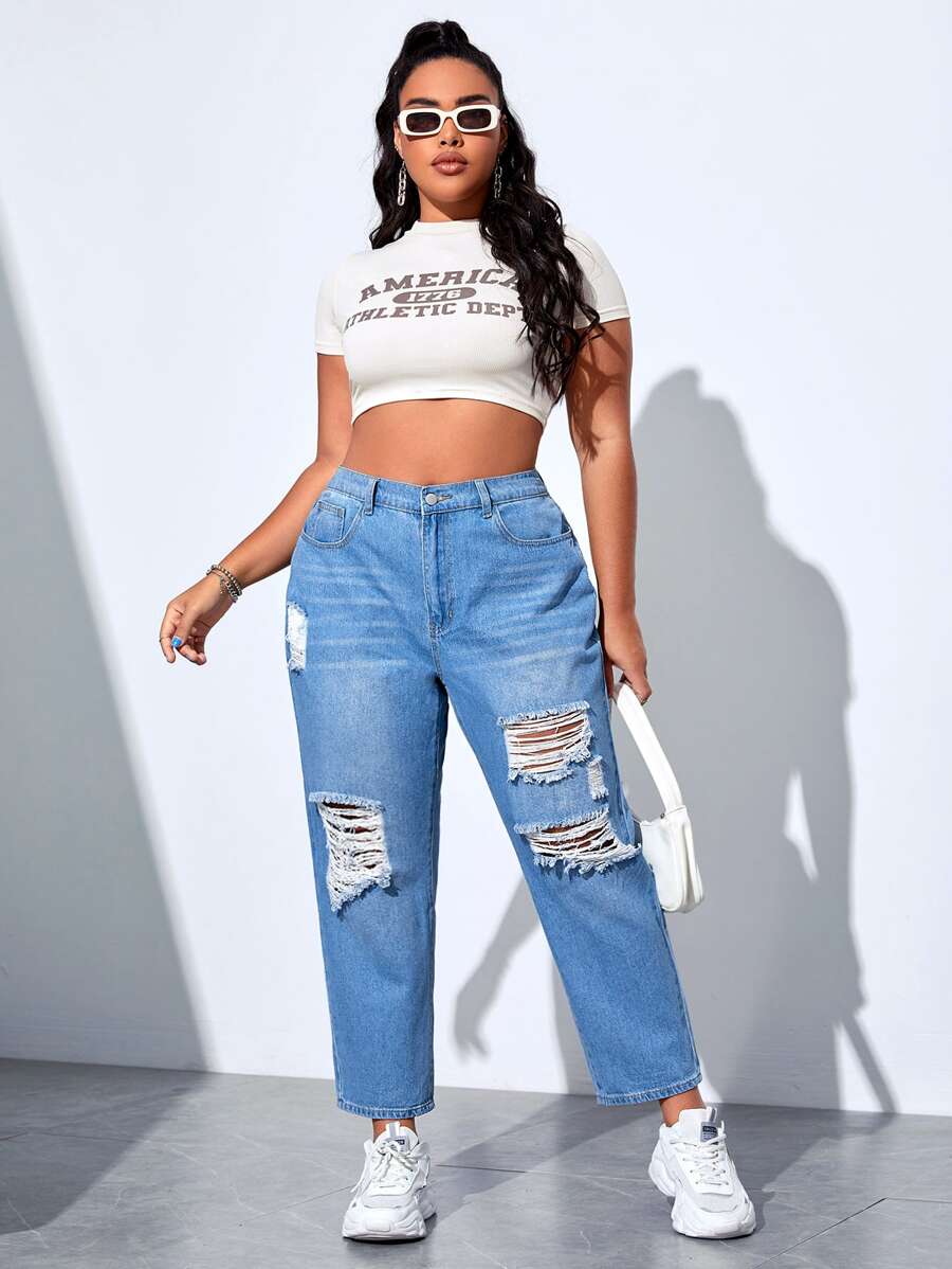 Jeans ajustados mom desgarro de talle alto