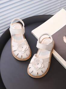 女孩花朵裝飾鏤空平底時尚白色踝帶涼鞋