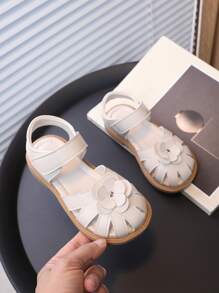 女孩花朵裝飾鏤空平底時尚白色踝帶涼鞋