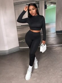 Slaydiva Conjunto de dos piezas de camiseta corta y leggings deportivos ajustados de yoga en unicolor - Negro - Ver 4