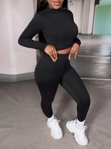 Slaydiva Conjunto de dos piezas de camiseta corta y leggings deportivos ajustados de yoga en unicolor - Negro - Ver 8