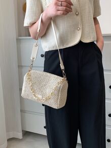 Bolsa de mimbre minimalista con cadena