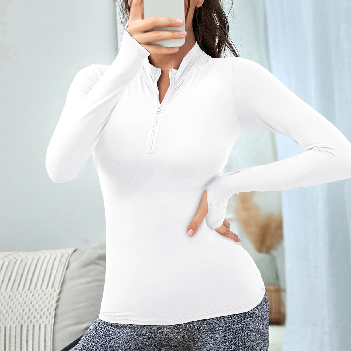 Sudadera deportiva unicolor con cremallera media