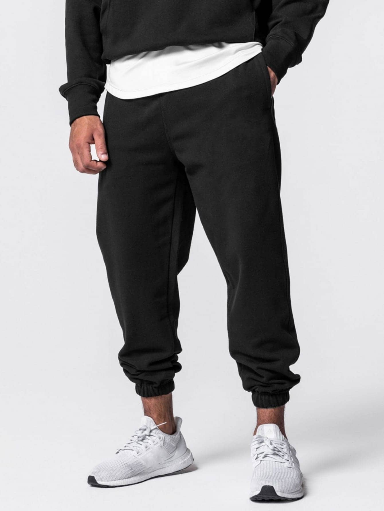 Manfinity Sport Corelite Men Solid Slant Pocket Sports Trousers - Black - View 1