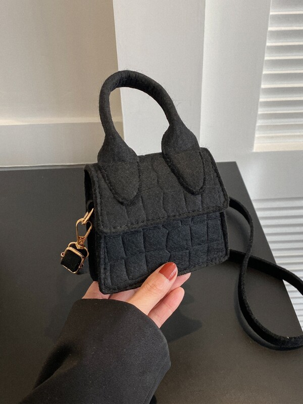 Bolsa cuadrada mini con cocodrilo en relieve con solapa