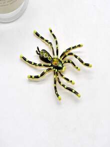 Broche con diseño de araña