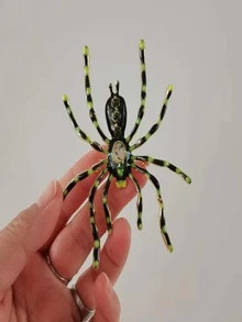 Broche con diseño de araña