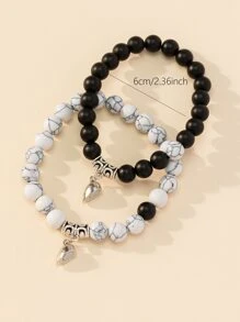 Set de 2 pulseras de hombre con cuentas mate con efecto agrietado y dije magnético de corazón, como regalo de San Valentín