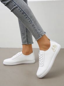 運動板鞋適用於女士自行車圖案前綁帶運動鞋