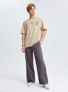 Manfinity VCAY Camiseta holgada con eslogan y gráfico de dibujos animados para hombres - Beis - Ver 5