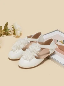 女孩花朵裝飾T字帶時尚白色平底鞋