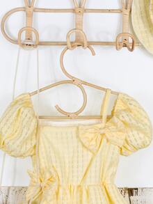 小女童泡泡袖前蝴蝶結洋裝附帽子