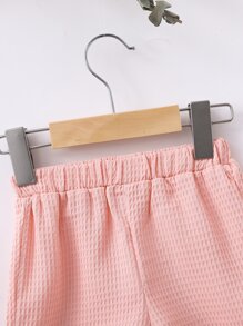 嬰兒素色荷葉擺背心上衣和短褲