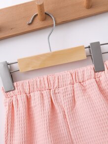 嬰兒素色荷葉擺背心上衣和短褲