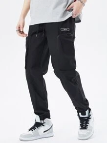 Manfinity Men Letter Graphic Flap Pocket Drawstring Waist Cargo Trousers - Black - View 1