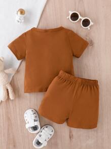 Conjunto de camiseta y pantalón corto con textura de dibujos animados para bebé niño