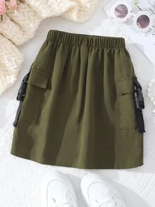 女孩翻蓋口袋帶扣細節工裝裙