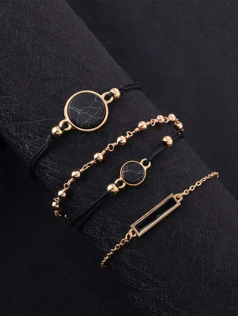 Vòng tay trang trí hình tròn 4 cái/bộ - màu đen - Xem 1