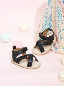 嬰兒交叉透氣鏤空踝帶時尚黑色涼鞋