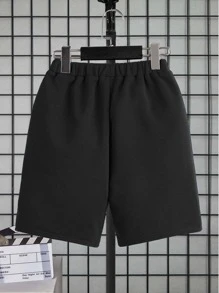 SHEIN 男孩卡通和字母圖案短褲
