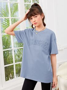 SHEIN Solid Color Loose Round Neck Teen Girls' Letter Print Dropped Shoulder T-Shirt