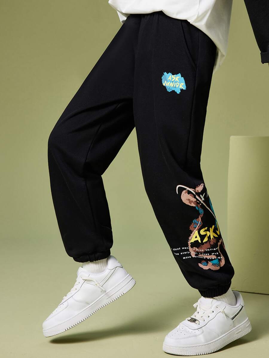 Chicos Pantalones deportivos con estampado de slogan - Negro - Ver 1