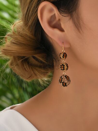 أقراط متدلية دائرية نمط الفهد