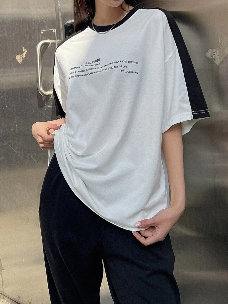 Slogan Graphic Contrast Side Seam Drop Shoulder Tee LEISURE EMBRACE THE FUTURE LIFE IS A CHAIN OF MONMENTS OF ENJOYMENT NOT ONLY ABOUT SURVIVAL IN THIS ORDINARY LIFE, WE MUST SEE THE GOOD SIDE OF LIFE LET LOVE SHINE Oversized T-Shirt