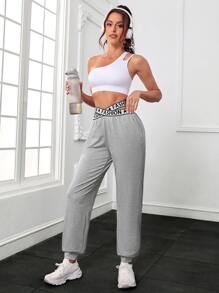 交叉腰部字母條帶斜口袋運動褲