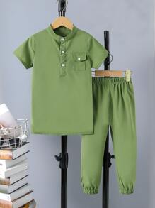 小男童翻蓋口袋下擺開叉上衣和褲子