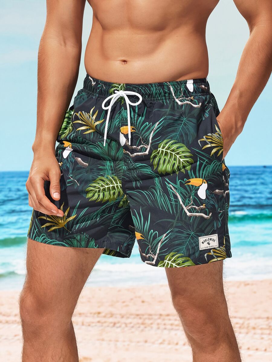 Surfspeed Men Tropical Print Letter Patched Detail Drawstring Waist Swim Trunks