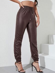 皮革外觀腰部抽繩束腳牛仔褲