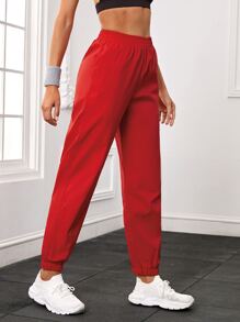 Pantalones deportivos unicolor con bolsillo oblicuo - Rojo - Ver 5