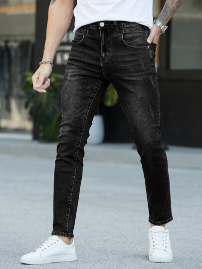 Jeans aderenti con tasche oblique e zip