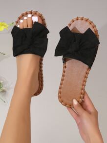 女性蝴蝶結裝飾編織平底度假仿麂皮涼拖適合夏天