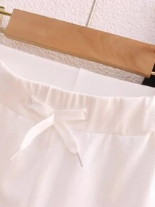 SHEIN 小男童2入組前打結運動短褲 - 黑與白 - 查看 4