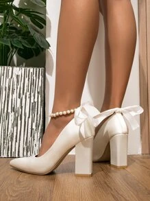 时尚珍珠蝴蝶结尖头高跟鞋，适合婚礼季节