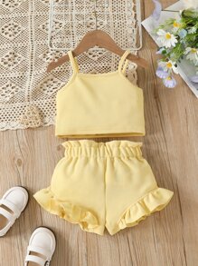 嬰兒字母圖案吊帶上衣和荷葉邊前蝴蝶結短褲