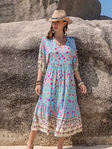 Rusttydustty 这款波西米亚绿色热带印花V领短袖连衣裙适合日常穿着，也适合海边度假和音乐节等场合。 - 彩色 - 查看 4