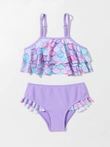 年轻女孩鱼鳞褶边比基尼套装夏季海滩