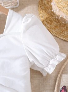 女孩前收褶泡泡袖上衣和印花荷葉邊半身裙