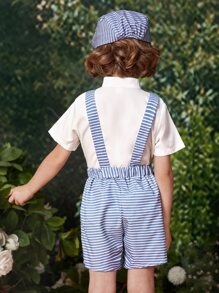 小男童前蝴蝶結襯衫和條紋圖案背帶短褲和帽