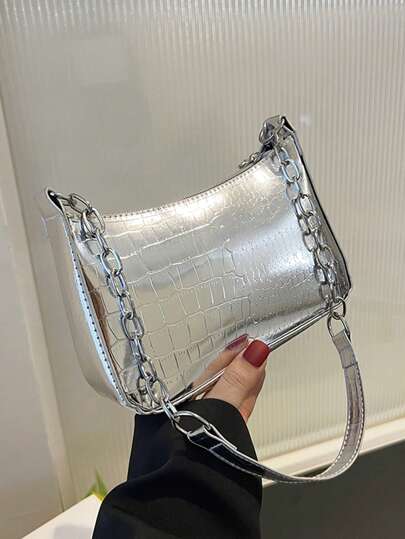 Bolso hobo mini con cocodrilo en relieve plata con cadena con tira