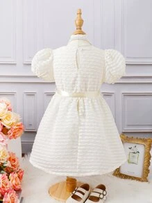 小女童泡泡袖繫腰帶洋裝