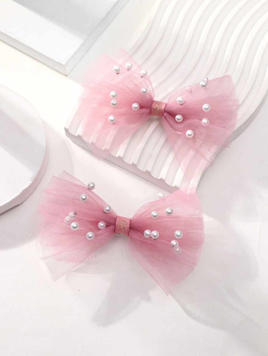 1對女童人造珍珠和蝴蝶結裝飾髮夾用於髮飾