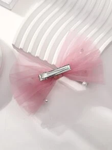 1對女童人造珍珠和蝴蝶結裝飾髮夾用於髮飾