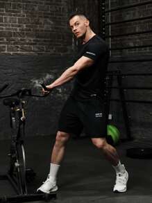 Manfinity Sport Corelite Conjunto deportivo con gráfico de lema para hombre, traje atlético, conjunto de chándal para entrenamiento, top transpirable para gimnasio - Negro - Ver 5